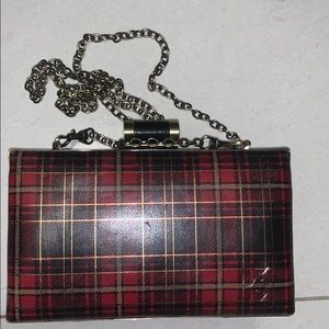 A Patricia Nash Leather Purse.